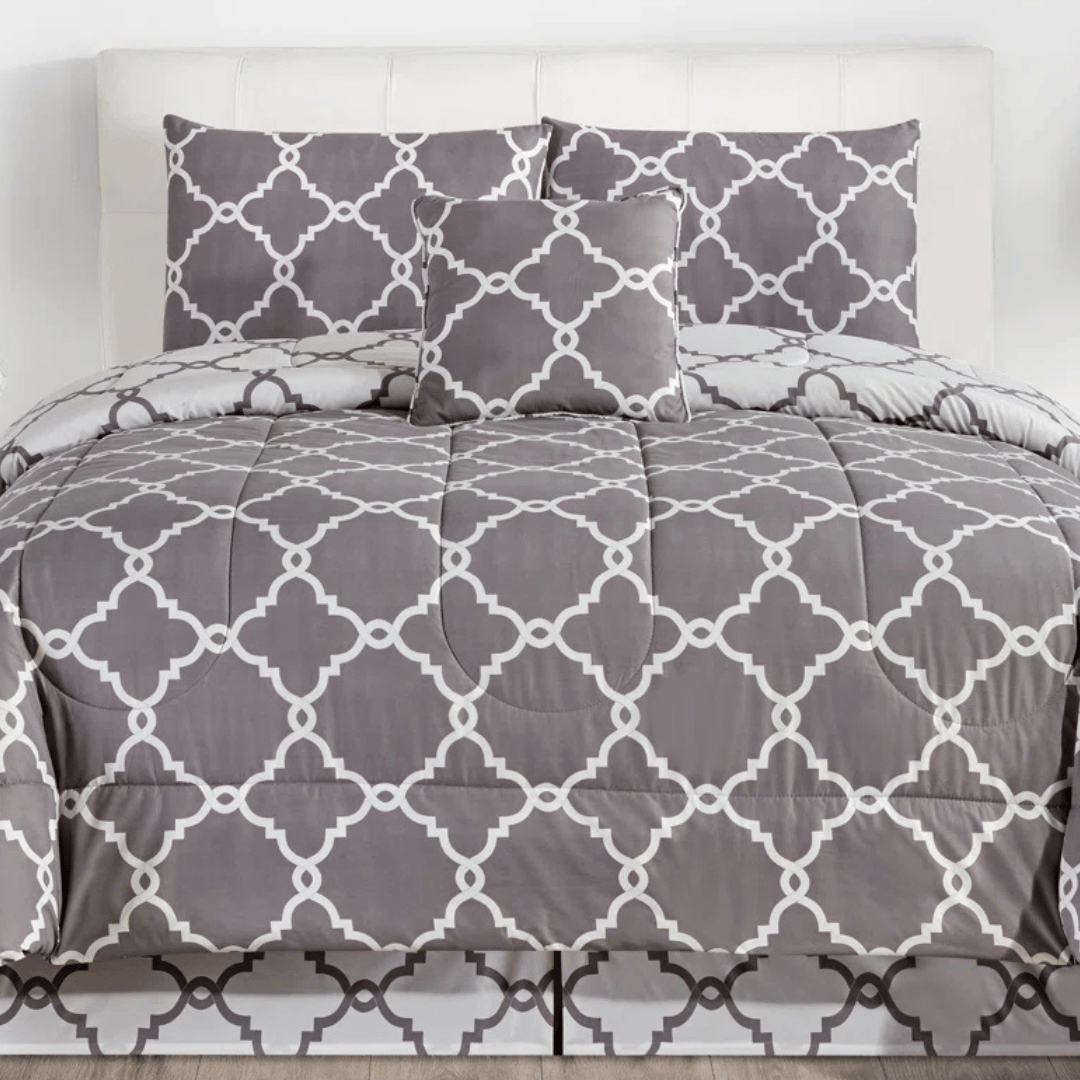 A gray and white comforter set featuring a geometric lattice pattern, including a comforter, two pillow shams, and a decorative pillow.