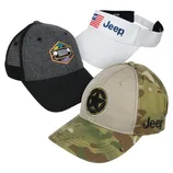 Three caps are shown: a gray and black trucker cap with a Jeep grille patch, a white visor with a Jeep logo and American flag, and a khaki and camouflage cap with a black star and the Jeep logo.