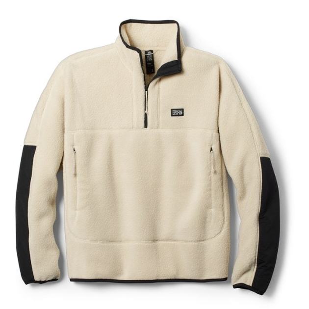 Beige fleece pullover with a quarter-zip front, black panels on the undersides of the sleeves, and a chest pocket, featuring a small square logo on the front.