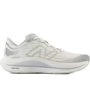 The New Balance FuelCell Walker Elite Shoes are sleek, white athletic sneakers with a perforated design for breathability. They feature the FuelCell cushioning for enhanced comfort and performance.