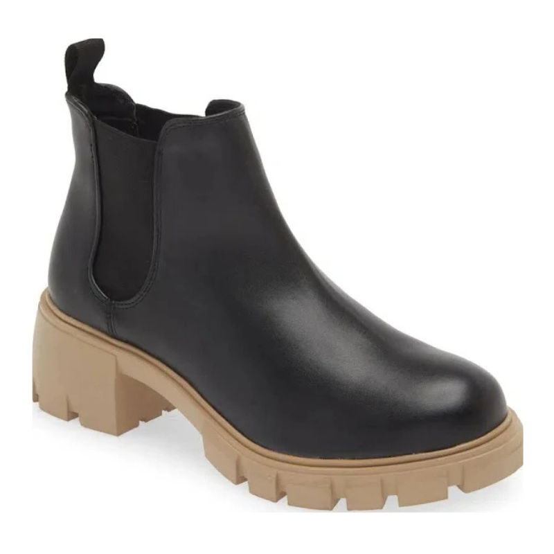 Black Chelsea boot with a chunky beige sole.
