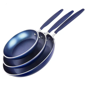 Three blue non-stick frying pans with blue handles are stacked in descending order.