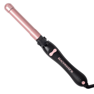 Beachwaver B1 rotating curling iron with a pink barrel and black handle, featuring control buttons and a power indicator.