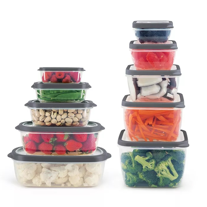 The Art & Cook 20pc Plastic Food Storage Set includes a variety of clear containers with grey lids, featuring neatly stacked sizes filled with fruits, vegetables, and nuts, designed for convenient storage and organization.