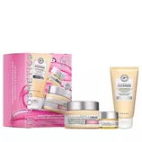 IT Cosmetics Hydrating Skincare Trio includes \“Confidence in a Cream,\“ \“Confidence in a Cleanser,\“ and an eye cream, designed for healthy hydration. Packaging is pink with product images.