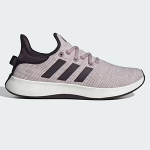 A single light gray sneaker with distinctive dark stripes and a white sole.