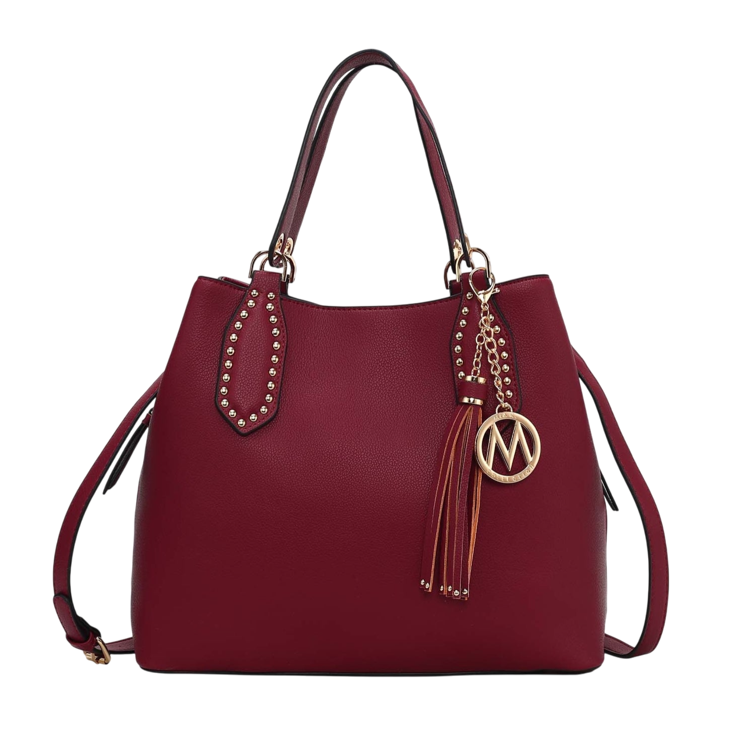 A maroon handbag with dual handles, gold-tone stud detailing, and a detachable shoulder strap. It features a decorative tassel and charm with a logo accent.