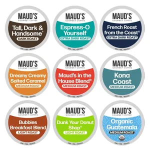 Nine Maud's Gourmet Coffee pods with different roasts: Tall, Dark & Handsome (Dark), Espress-O Yourself (Extra Dark), French Roast (Extra Dark), Dreamy Creamy Salted Caramel (Medium), Maud's in the House (Medium), Kona Coast (Medium), Bubbies Breakfast (Light), Dunk Your Donut (Light), and Organic Guatemala (Medium).