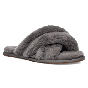 Gray fuzzy slipper with crossed straps and a flat sole.