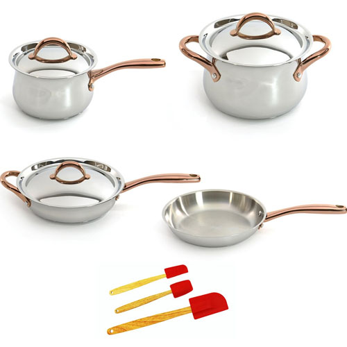 A set of stainless steel cookware including a saucepan with lid, stockpot with lid, sauté pan with lid, skillet, and three red silicone spatulas with wooden handles.
