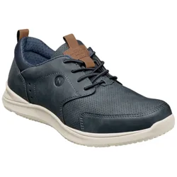 A navy blue casual sneaker with perforated detailing, white sole, brown accents, and lace-up closure, featuring a subtle logo on the side.