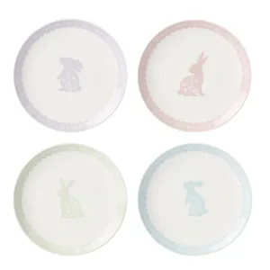 Set of four ceramic plates featuring pastel-colored rabbits and floral patterns, each with a scalloped border in pink, yellow, blue, and purple.