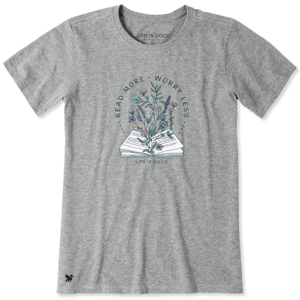 Gray T-shirt with a design of an open book with flowers and the text \“READ MORE, WORRY LESS\“ and \“LIFE IS GOOD.\“