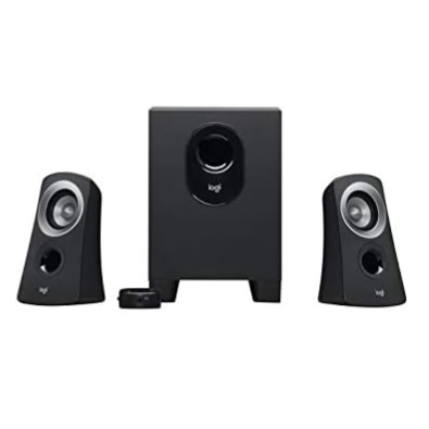 Logitech speaker system with two satellite speakers and a subwoofer, featuring a compact design and a volume control knob.