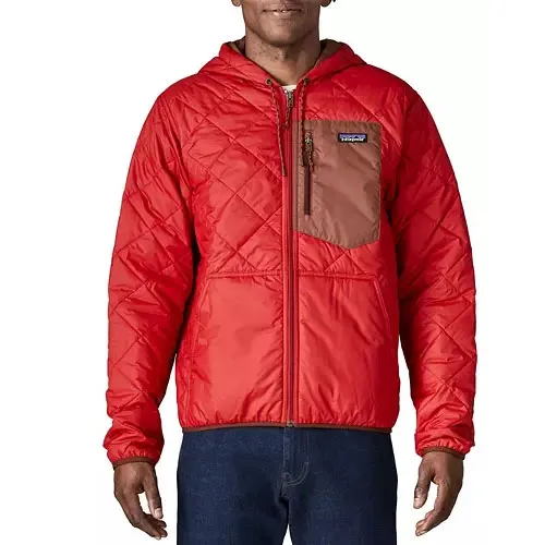 A red quilted jacket with a hood, featuring a contrasting brown chest pocket, worn by a person standing.