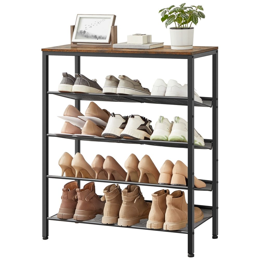 A black metal shoe rack holds assorted footwear, including sneakers, heels, and boots, with a wood top displaying a plant, a small photo frame, and a box.