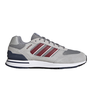 Adidas sneaker with a gray base, maroon stripes, and a mesh upper, featuring a cushioned midsole and rubber outsole for comfort and durability.