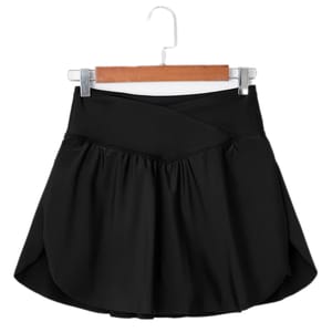 A black high-waisted swim skort with a crossover waistband and slightly pleated skirt. It's designed for a comfortable fit and versatile swimwear style.