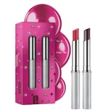 Two silver lipsticks are shown alongside a vibrant pink gift box featuring star designs and space for \“To/From\“ labeling.