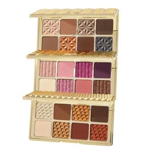 An eyeshadow palette with three foldable tiers featuring a variety of shades, including neutrals, pinks, and metallics. Each shadow is textured with distinctive patterns.