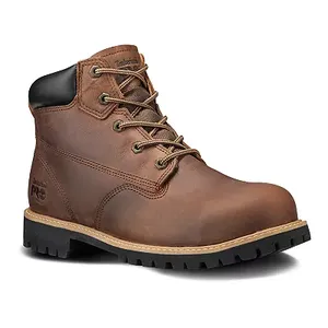 Brown leather work boots with a padded collar, metal eyelets for laces, and a thick, treaded rubber outsole. The boots feature the Timberland logo on the side.