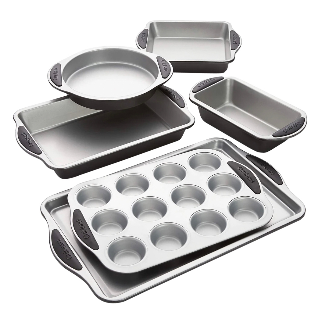 A set of nonstick baking pans includes a muffin pan, two rectangular baking pans, a circular cake pan, and two loaf pans, each with silicone handles for easy grip.