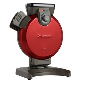 Cuisinart Vertical Waffle Maker features a red, upright design with a dial for temperature settings and indicator lights for baking progress. Compact and space-saving, it ensures even cooking of waffles.