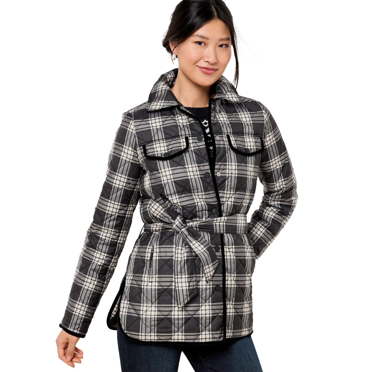 A black-and-white plaid quilted shirt jacket with a belted waist, button closure, two chest pockets, and contrasting trim accents.