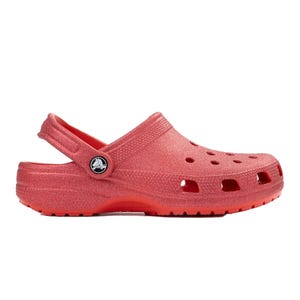 Red Crocs clog with adjustable heel strap and ventilation holes, featuring a textured finish and brand emblem on the side.