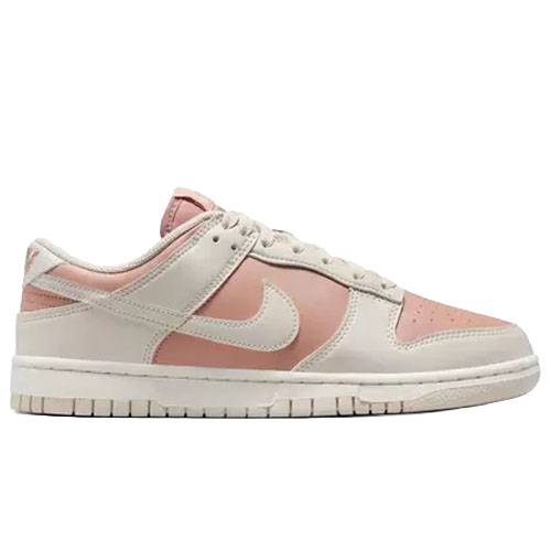 A low-top sneaker with a pink and beige color scheme, featuring a prominent Nike Swoosh and white laces.