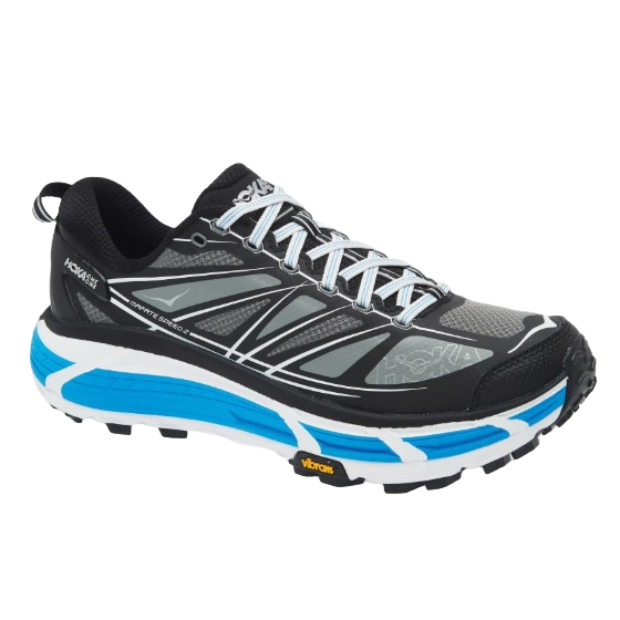 Running shoe with black, grey, and blue accents featuring cushioned sole and Vibram outsole for traction.
