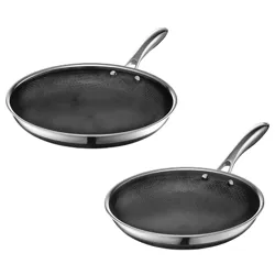 Two stainless steel frying pans with a textured, non-stick interior surface and ergonomic handles.