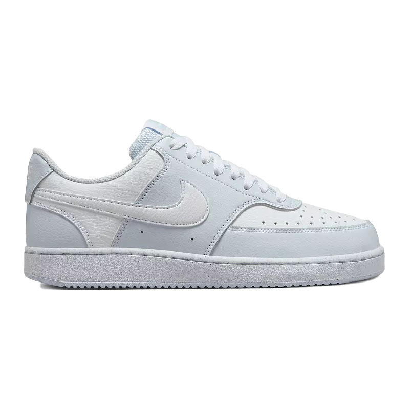 A white Nike sneaker with a classic low-top design, featuring a leather upper and a swoosh logo on the side.