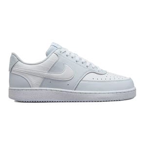 A white Nike sneaker with a classic low-top design, featuring a leather upper and a swoosh logo on the side.