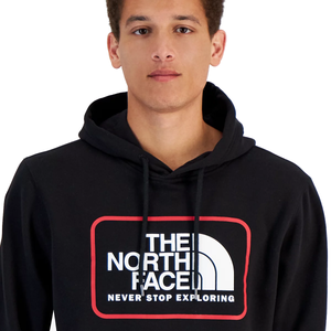 Black hoodie featuring The North Face logo in white with a red border and the slogan \“Never Stop Exploring\“ beneath it.