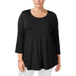 A woman models a black three-quarter sleeve tunic top paired with white pants. The tunic has a scoop neckline and a relaxed fit.