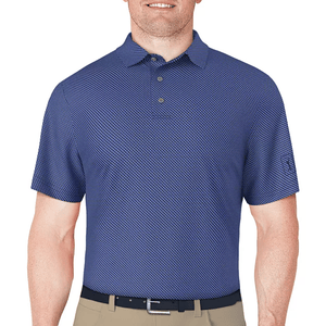 A blue, short-sleeve, collared golf polo with a subtle geometric pattern, featuring a three-button placket. It is paired with beige khaki pants and a dark belt.