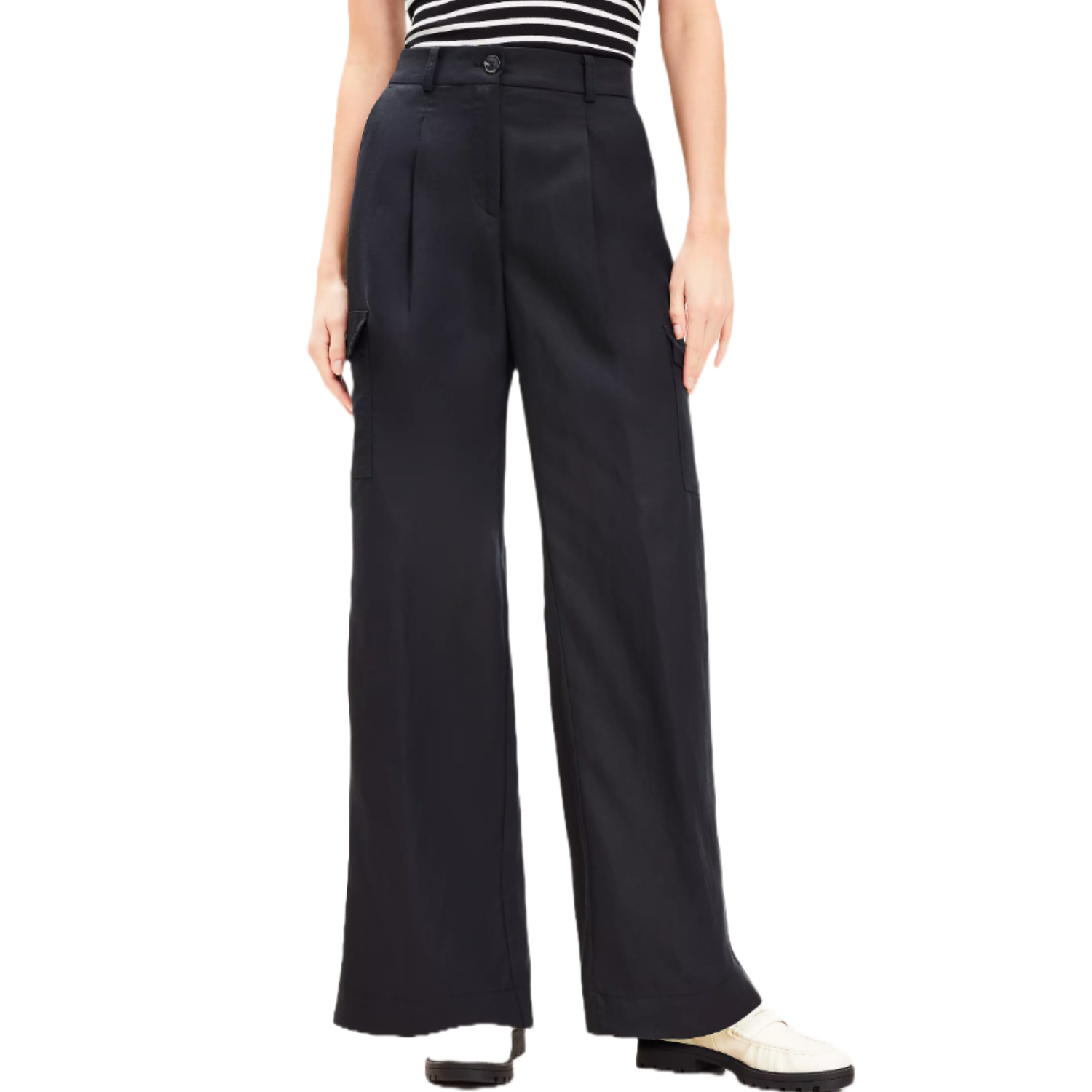 Wide-leg black pants with a high waist, front button closure, and side pockets, paired with a black and white striped top and white shoes.