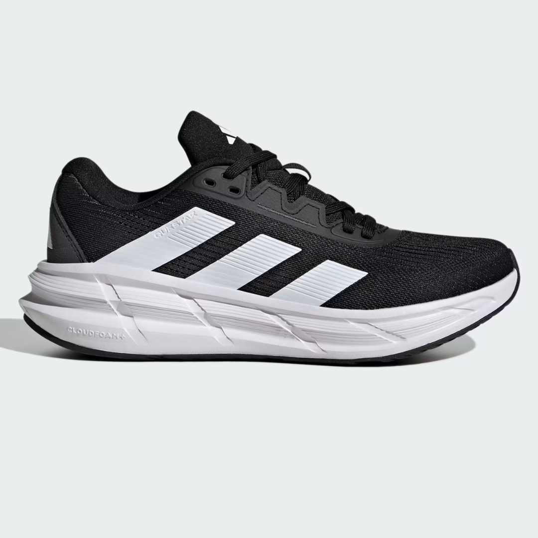 A black and white running shoe with 'CLOUDFOAM' on the sole and three stripes on the side.