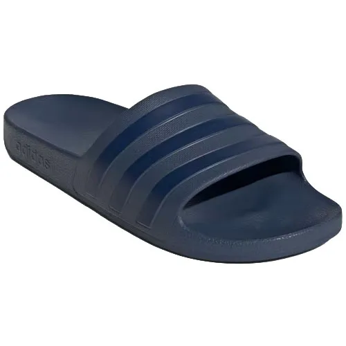 A navy blue Adidas slide sandal featuring three signature stripes on the strap.