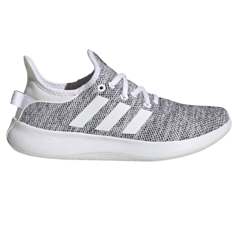 A gray and white sneaker with three white stripes on the side, featuring a textured knit upper and a white Cloudfoam sole.