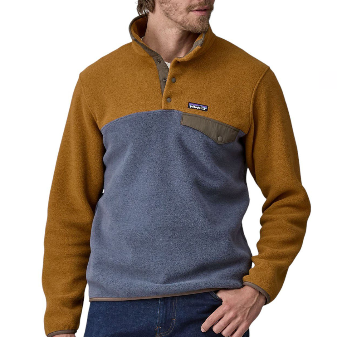 Patagonia Synchilla Pullover featuring a color-block design with a tan top half and blue bottom half, snap-button collar, and a chest pocket with buttoned flap.