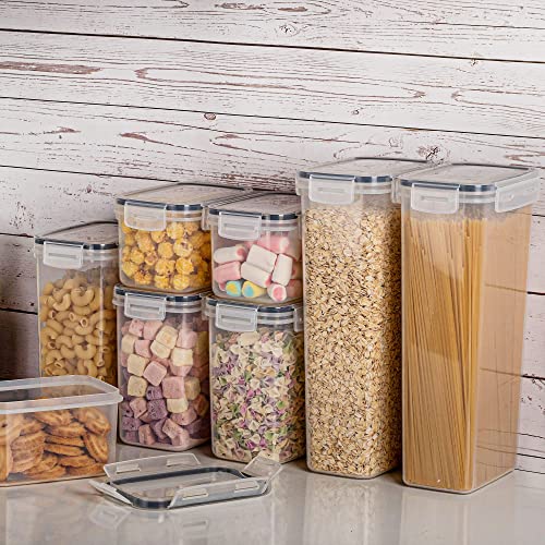 A set of clear plastic food storage containers with airtight lids, in various sizes, suitable for storing a range of dry foods such as pasta, cereal, and snacks.