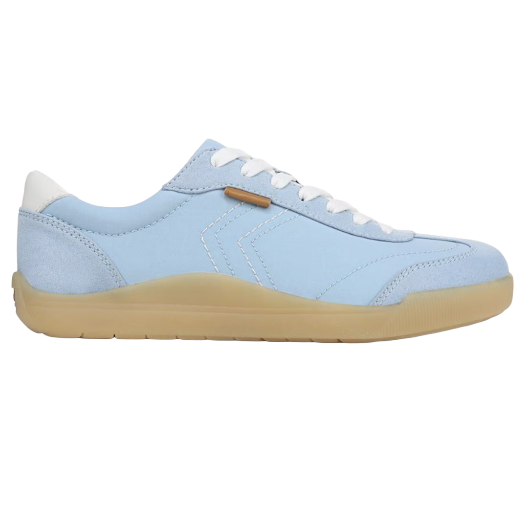 Light blue low-top sneakers with a gum sole, white laces, and subtle stitched detailing on the sides.
