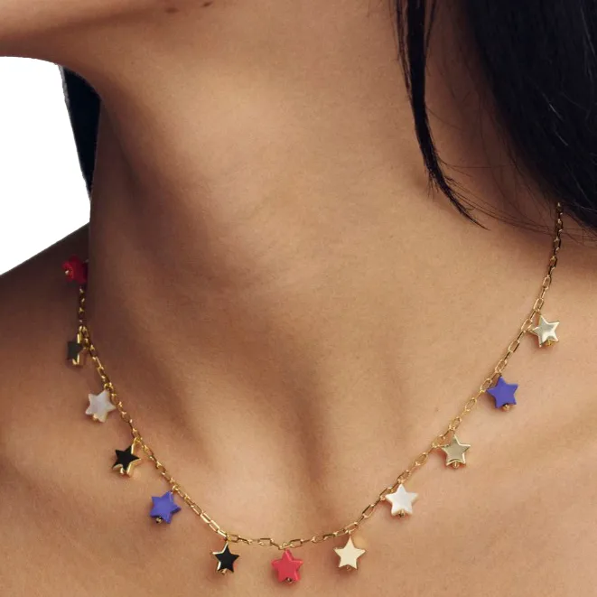 A necklace with a gold chain features star-shaped pendants in various colors, including gold, black, purple, red, and white.