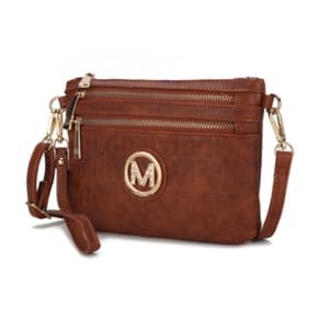 A brown MKF crossbody wristlet with a gold-toned circular logo, front zipper pocket, and an adjustable strap.