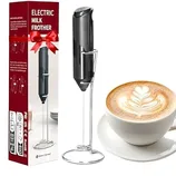 Electric milk frother with a sleek black design, shown with a packaging box and a cup of coffee displaying latte art.
