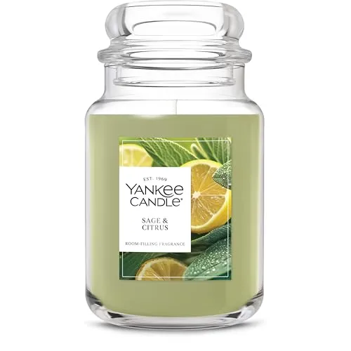 Yankee Candle in \“Sage & Citrus\“ scent, featuring a large glass jar with a green wax.