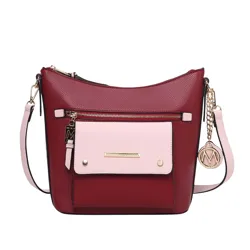 A burgundy and pink crossbody bag with a front pocket, gold accents, and a detachable strap.