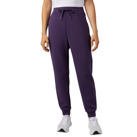 Purple joggers with a drawstring waist, paired with white sneakers.